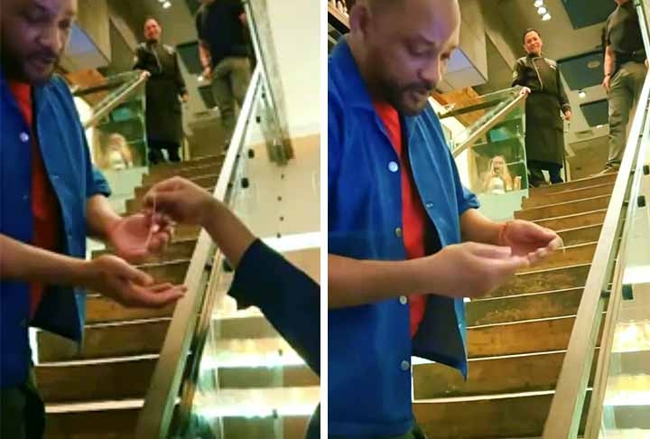 Antes do espetáculo, Will Smith protagonizou um momento emocionante com um rapaz que lhe presenteou com um escapulário.  Reprodução: Flipar