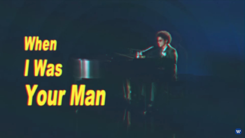 O segundo single lançado, “When I Was Your Man”, também atingiu a primeira posição da Billboard e foi indicado ao Grammy na categoria Melhor Performance Pop Solo. Reprodução: Flipar