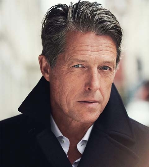 Com direção de Mike Newell, a comédia romântica “Quatro Casamentos e um Funeral” foi indicada ao Oscar de Melhor filme e Melhor Roteiro Original e rendeu a Hugh Grant o Globo de Ouro de Melhor Ator em Comédia ou Musical. 
 Reprodução: Flipar