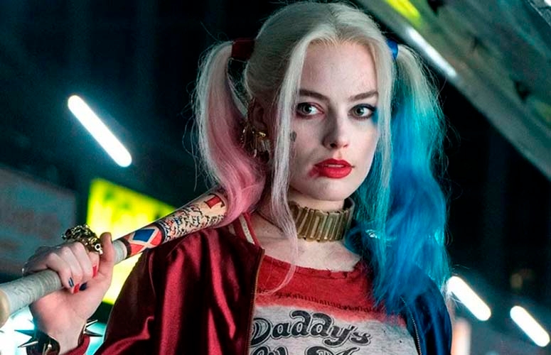 O papel de Arlequina entregou uma fama mundial para Margot Robbie, que fez sucesso entre o público juvenil com seu cabelo colorido. Reprodução: Flipar