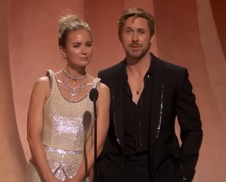 Os atores Ryan Gosling e Emily Blunt subiram ao palco e anunciaram a exibição de um vídeo curto que celebrou o trabalho dos dublês e sua importância para a indústria do cinema.  Reprodução: Flipar