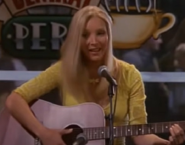 Curiosidade número 5:  A intérprete de Phoebe odiava tocar violão 