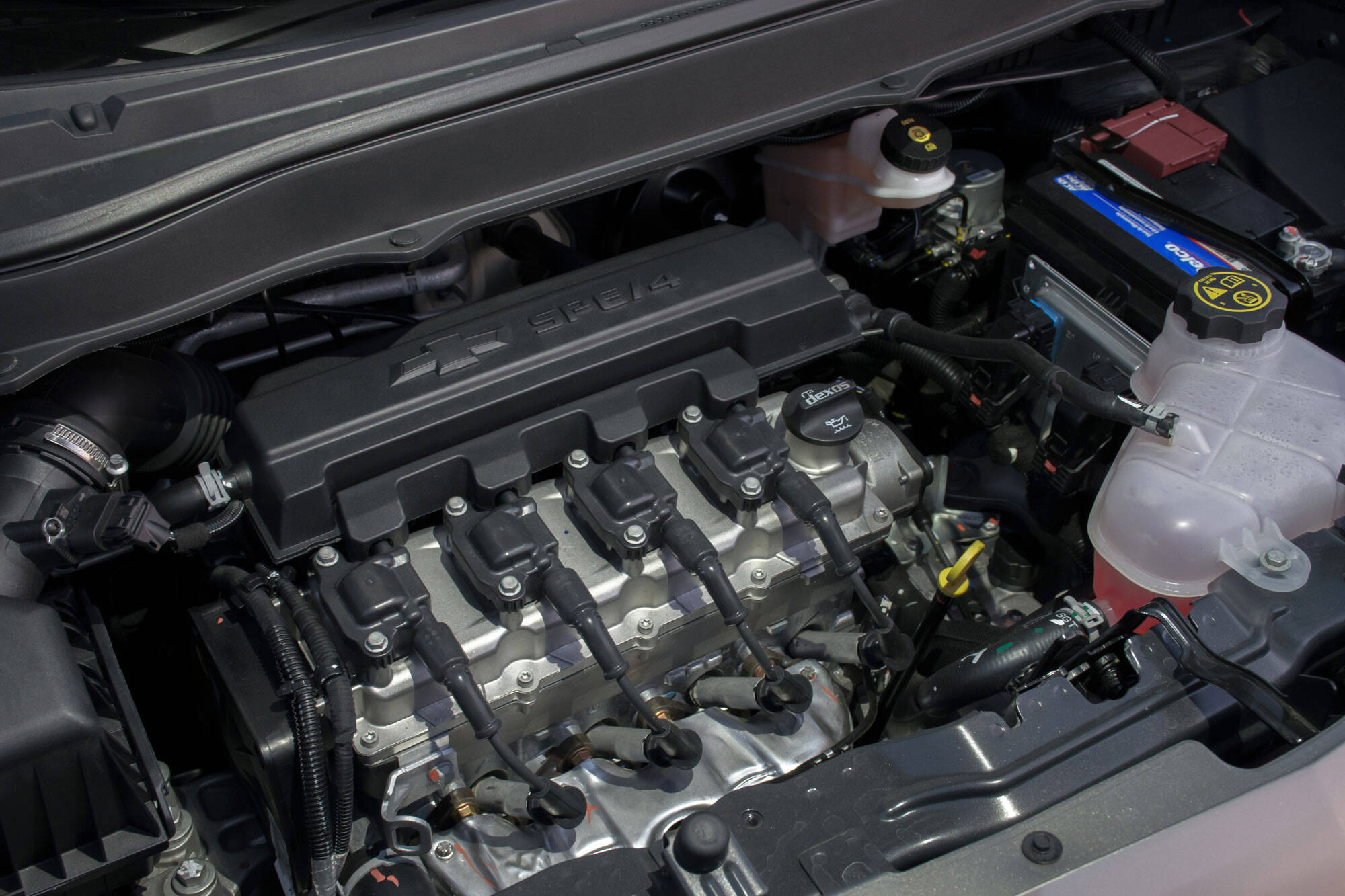 O motor 1.8 EconoFlex da Chevrolet Spin foi atualizado, tornando-se o 1.8 SPE/4. A mudança deixou a van bem mais econômica, fazendo até 13,7 km/l na estrada.. Foto: Divulgação/General Motors
