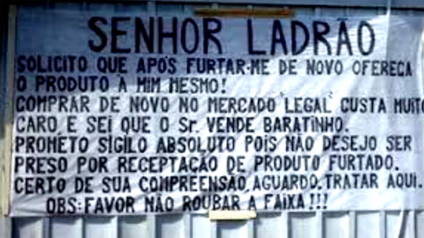 Aqui, a vítima pede que o ladrão venda o produto para ela mesma: baratinho, claro. E pede que ao menos a faixa do aviso não seja levada!  Reprodução: Flipar