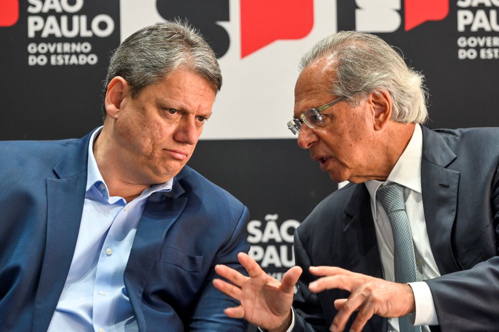 O governador de São Paulo, Tarcísio de Freitas, e o ex-ministro Paulo Guedes