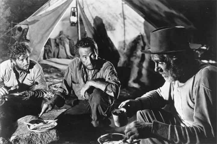 “O Tesouro de Sierra Madre” - Com direção e roteiro de John Huston, o filme retrata o garimpo do ouro nas montanhas mexicanas nos anos 20 do século passado. Humphrey Bogart (“Casablanca”) encarna um dos protagonistas. 

 Reprodução: Flipar