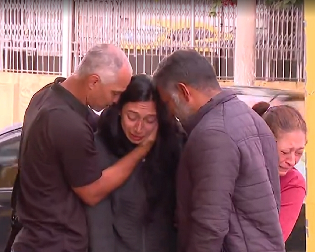Durante o enterro, a esposa de Hugo, Larissa, precisou ser amparada por amigos e familiares.