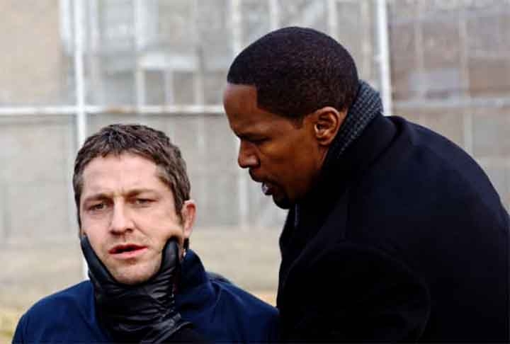 Código de Conduta (2009): dirigido por F. Gary Gray, é um suspense de ação que gira em torno de Clyde Shelton (Gerard Butler), um homem que busca vingança depois que o sistema de justiça falha ao punir os responsáveis pela morte de sua família. Shelton, um ex-agente do FBI, planeja um elaborado esquema para se vingar dos envolvidos e expor a corrupção no sistema legal. O filme combina elementos de suspense e ação, explorando temas de justiça, moralidade e o impacto do sistema legal na vida dos indivíduos. Reprodução: Flipar