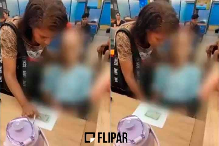 Vídeo que viralizou na internet mostra Érika pedindo ao homem, morto em uma cadeira de rodas, que assinasse a ordem de pagamento do empréstimo. 
 Reprodução: Flipar