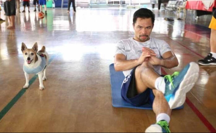 Lutador ao lado do cachorro. Foto: Instagram