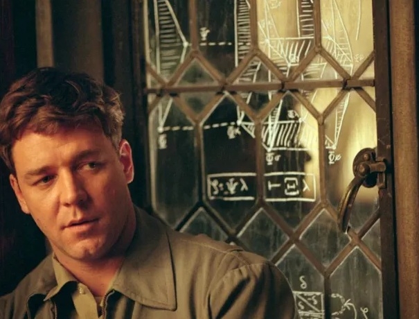 Uma Mente Brilhante (2002)
Dirigido por Ron Howard, estrelado por Russell Crowe, Jennifer Connelly e Ed Harris.
A vida do matemático John Nash, desde suas conquistas acadêmicas até sua batalha contra a esquizofrenia, destacando genialidade e superação.  Reprodução: Flipar